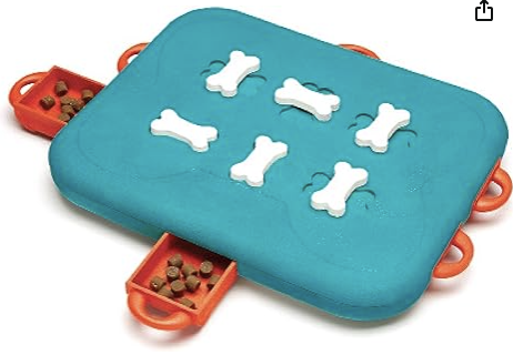 Outward Hound aqua plastic dog puzzle toy with moveable white bones and orange drawers